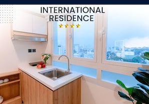 Studio, City View | Private kitchen | Full-sized fridge, microwave, stovetop, cookware/dishes/utensils