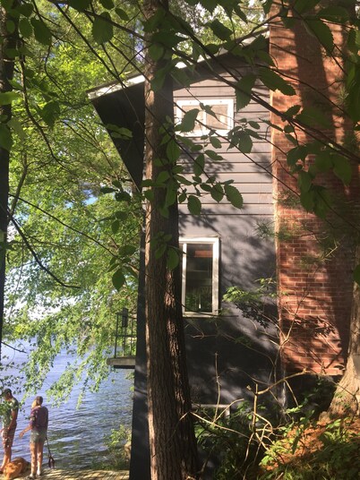 Cute, pet-friendly, house with hot tub overlooking the lake in Menomonie, WI.