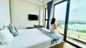 Deluxe Double Room, Balcony, City View | Blackout curtains, soundproofing, iron/ironing board, free WiFi