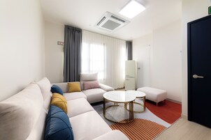 스위트 (B) | 거실 공간