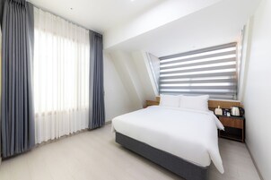 스위트 (A) | 오리/거위털 이불, 암막 커튼, 무료 WiFi, 침대 시트