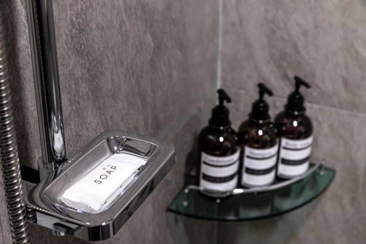 Shower, hair dryer, heated floors (bathroom), towels