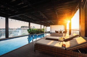 Indoor pool, open 6:30 AM to 8:00 PM, pool umbrellas, sun loungers