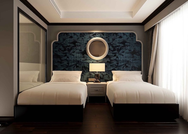 Ropa de cama de alta calidad, colchones con pillow-top y minibar 