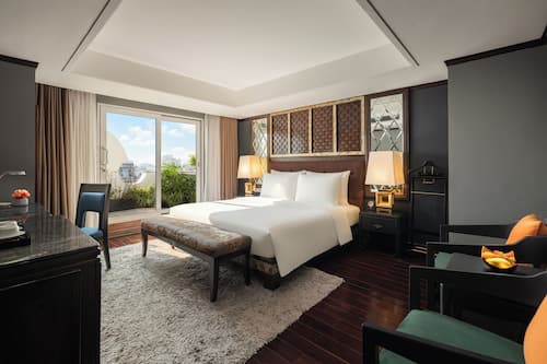 Suite, balcón, vista a la ciudad | Ropa de cama de alta calidad, camas con pillow-top y minibar