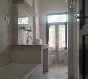Shower, towels, soap, toilet paper