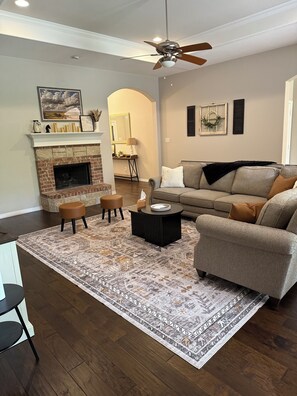Smart TV, fireplace, books