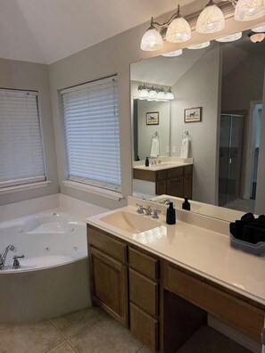 Jetted bath, hair dryer, towels, soap