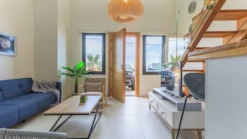 Sea Loft 1 | Living room | 43-inch Smart TV with digital channels, streaming services