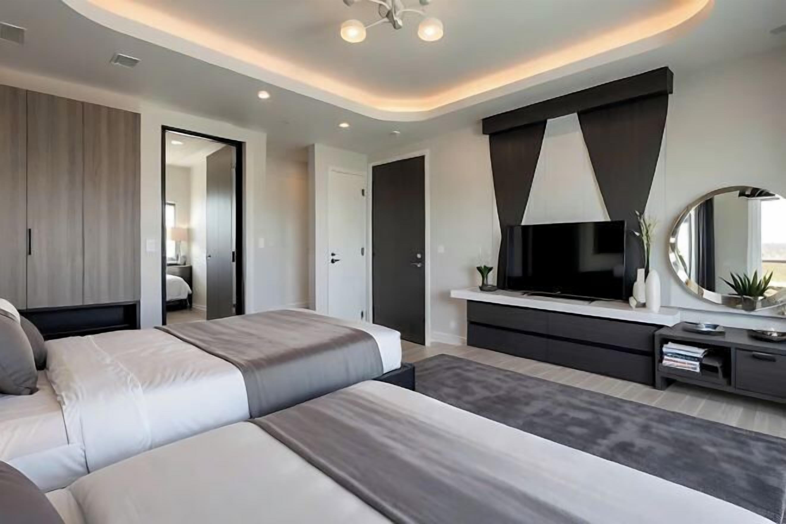 Premium bedding, memory foam beds, desk, laptop workspace