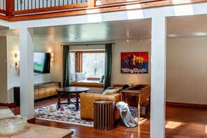 Smart TV, fireplace, books