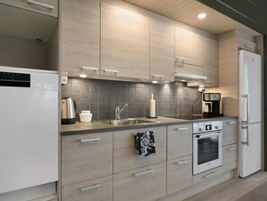 Fridge, microwave, dishwasher, cookware/dishes/utensils