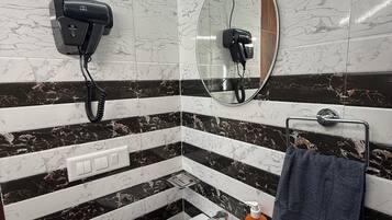 Hair dryer, towels, soap, toilet paper
