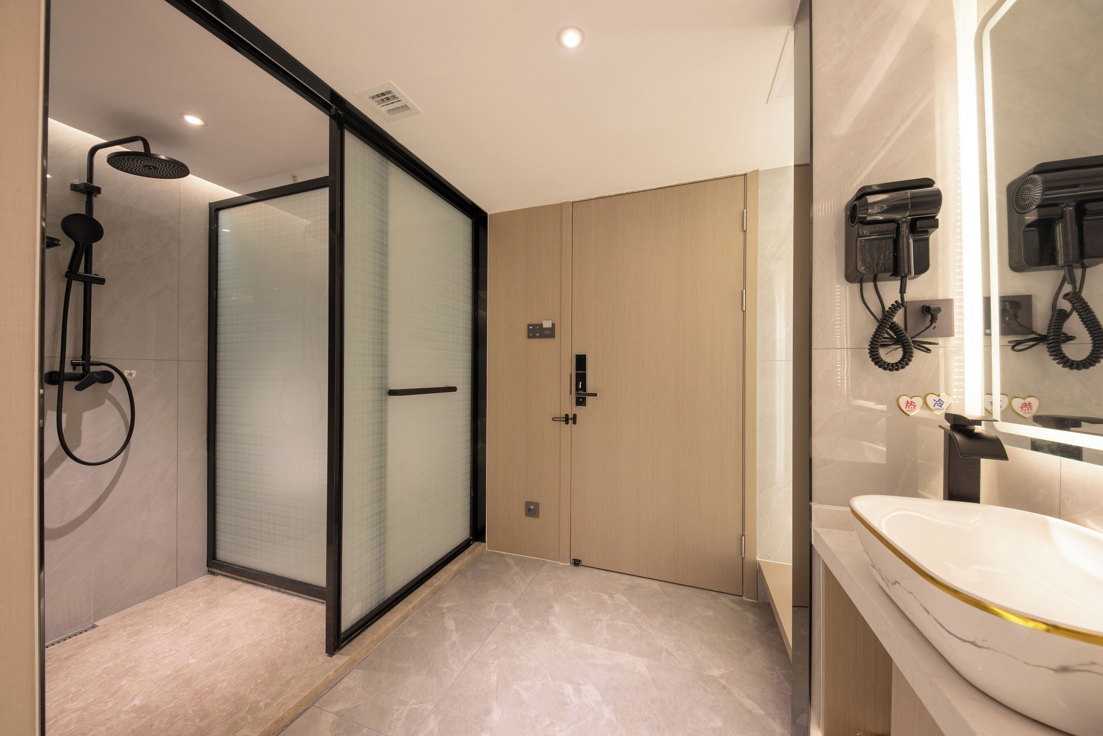 Shower, hair dryer, slippers, towels