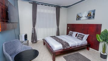 Departamento estándar, balcón | Área de sala de estar