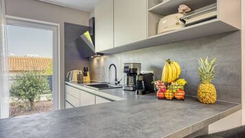 Family House, Multiple Bedrooms (Villa Aria with heated Pool and) | Private kitchen | Fridge, microwave, oven, stovetop