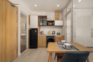 Apartment, 1 Bedroom, City View | Private kitchen | Fridge, microwave, rice cooker, cookware/dishes/utensils