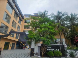 Front of property - evening/night - Hotel Montecarlo (Tirupporur)