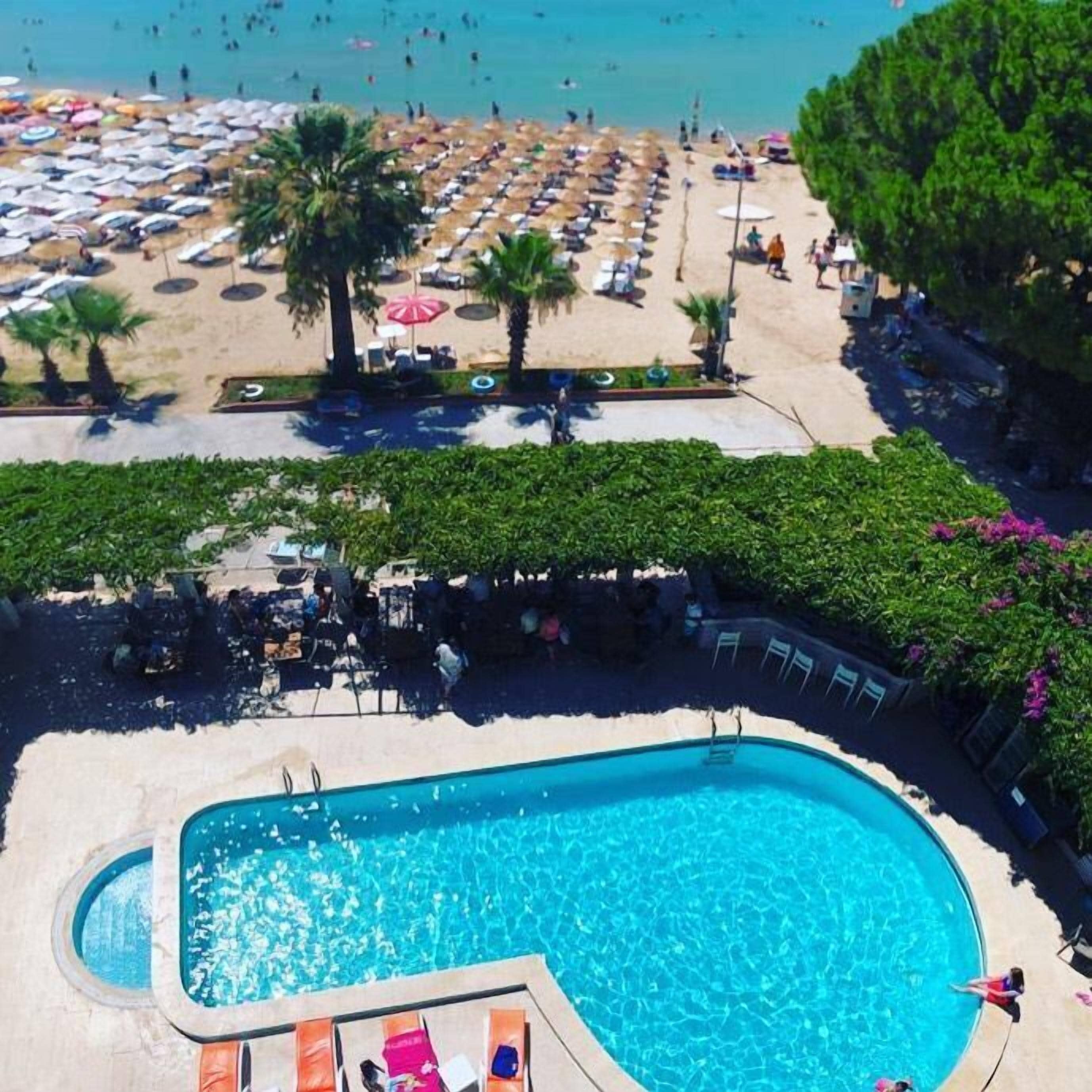 Seasonal outdoor pool, pool umbrellas, pool loungers