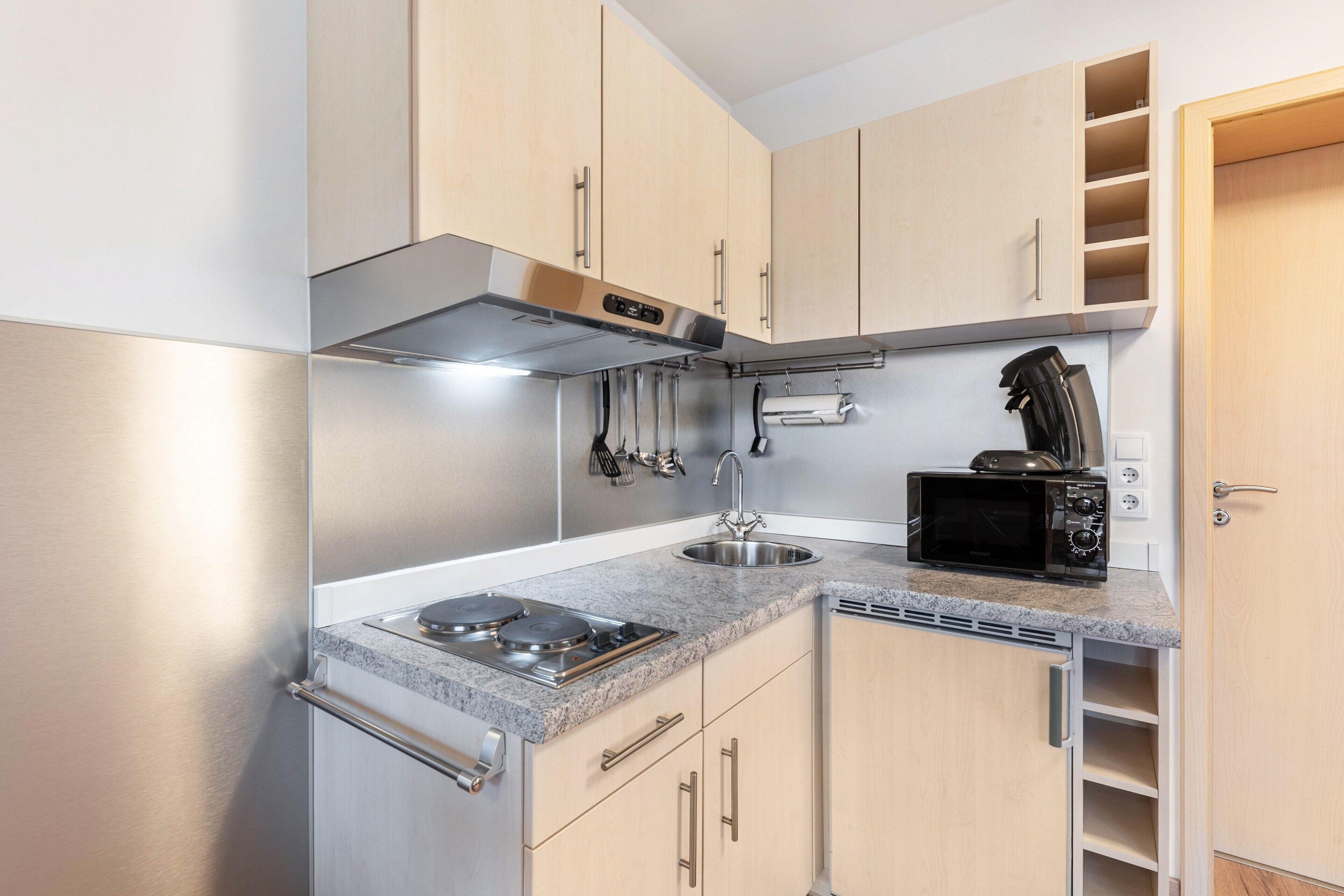 Fridge, microwave, stovetop, coffee/tea maker