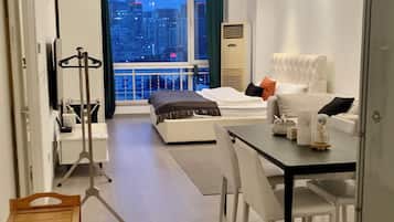 Comfort Apartment | Living area | 48-inch Smart TV with satellite channels