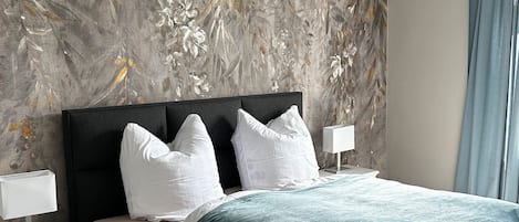 2 slaapkamers, een strijkplank/strijkijzer, gratis wifi, beddengoed