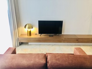 Apartamento Deluxe, 1 habitación | Sala de estar