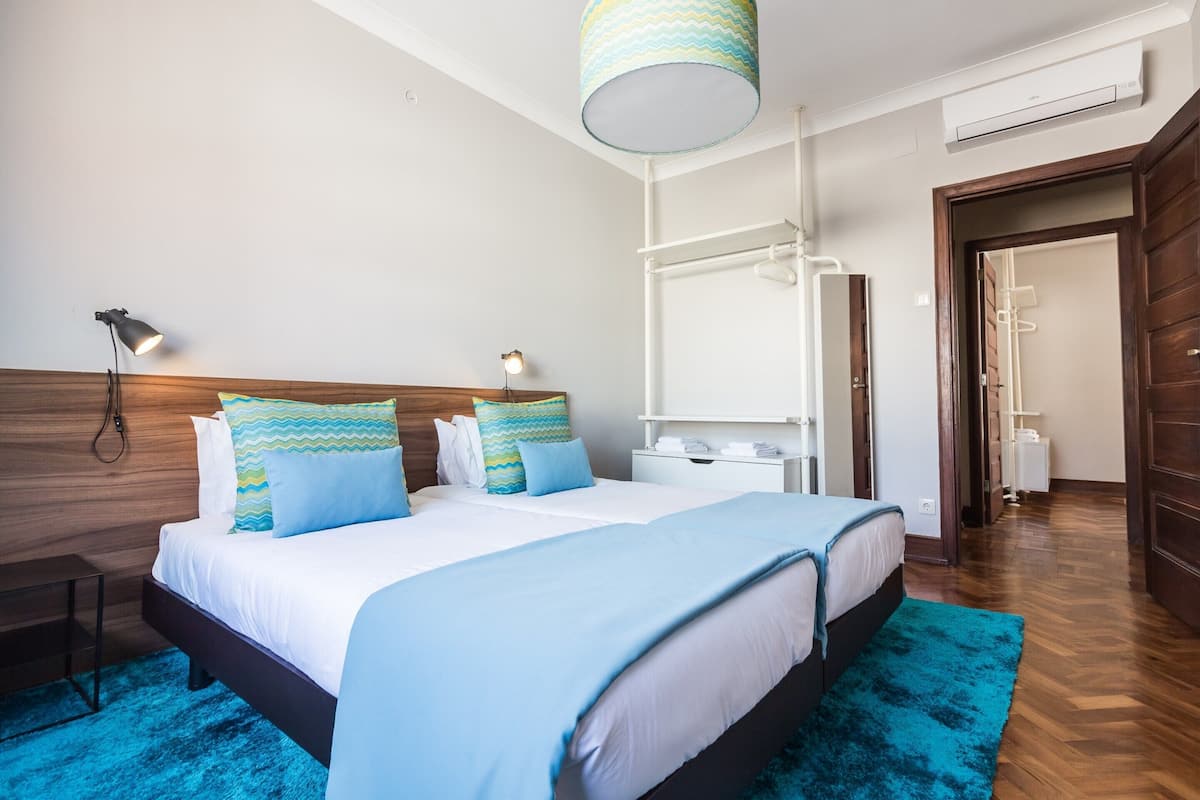 Appartement Deluxe, 4 chambres | 11 chambres, fer et planche à repasser
