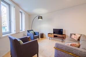 Apartamento premium, 2 quartos | Sala de estar