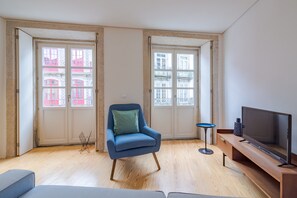 Apartamento superior, 2 quartos | Sala de estar