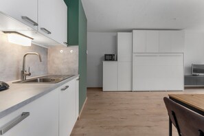 Fridge, oven, electric kettle, toaster