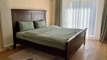 Family Apartment, City View | Desk, laptop workspace, blackout curtains, soundproofing