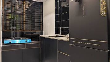 Fridge, microwave, stovetop, cookware/dishes/utensils