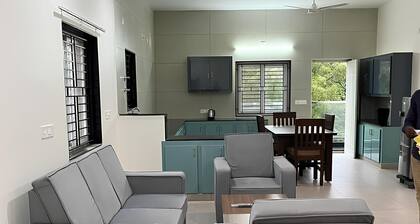 Luxe 2 BHK Flat with a vast living room, wifi and Air conditioning in Tirupati.