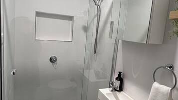 Hair dryer, towels, soap, shampoo
