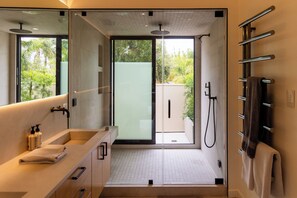 Shower, hair dryer, towels, soap