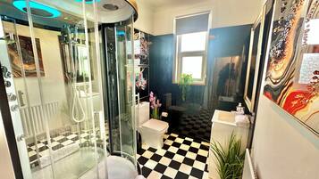 Shower, hair dryer, towels, soap