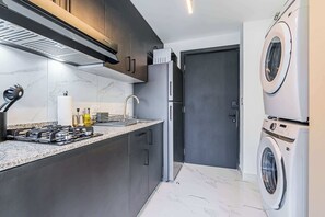 Fridge, microwave, stovetop, coffee/tea maker