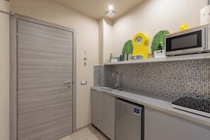 Fridge, electric kettle, toaster