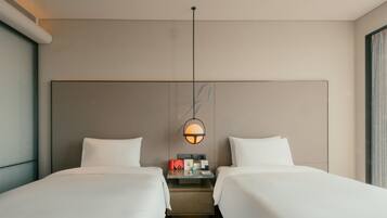 Down comforters, minibar, in-room safe, blackout drapes