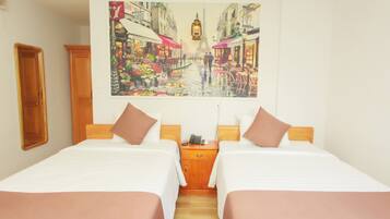 Junior Room, Partial Ocean View | In-room safe, desk, soundproofing, iron/ironing board