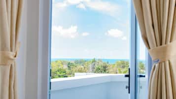 Panoramic Room, Partial Ocean View | In-room safe, desk, soundproofing, iron/ironing board