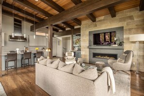 TV, fireplace - Ski-in/Ski-out Cabin with Hot Tub, Heated Garage, and a Fireplace on the Deck! (Big Sky)