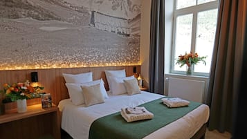 Junior suite (Accès Spa inclus) | Een kluis op de kamer, verduisterende gordijnen, geluiddichte muren