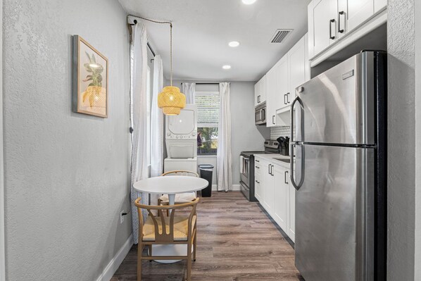 Fridge, microwave, stovetop, coffee/tea maker