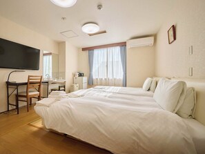 Habitación Deluxe con 2 camas individuales | Escritorio, espacio para trabajar con un portátil, wifi gratis