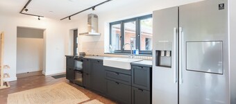 Stunning modern farmhouse retreat perched on a private hilltop in North Wales