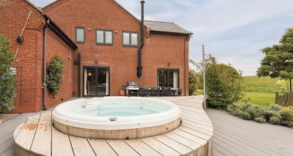 Stunning modern farmhouse retreat perched on a private hilltop in North Wales