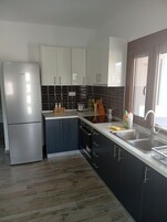 Deluxe Βίλα, Μπαλκόνι, Θέα στην Αυλή | Ιδιωτική κουζίνα