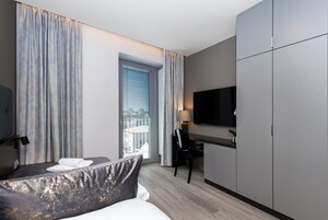 Habitación individual básica, 1 habitación | Espacio para trabajar con un portátil, cortinas opacas, wifi gratis